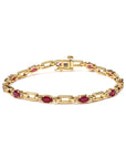 10K Yellow Gold Oval Ruby and 1/10 Cttw Diamond Wristlet