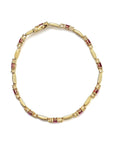 10K Yellow Gold Oval Ruby and 1/10 Cttw Diamond Wristlet